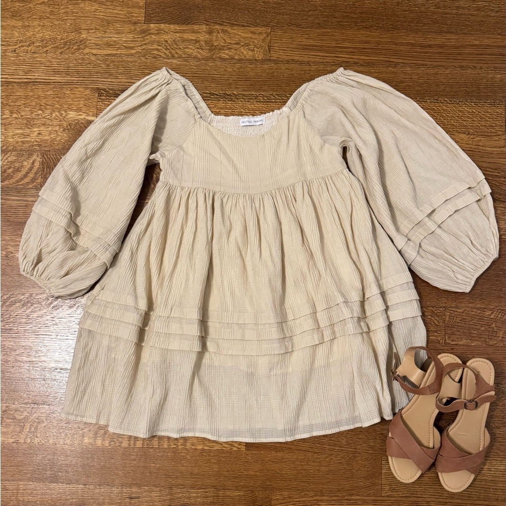 Neutral Ground Cream babydoll dress. Size medium. Lined with pockets. Never worn
